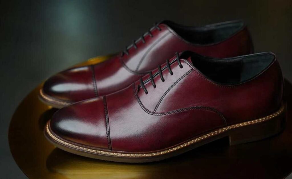 Navy shoe cream on burgundy, dark brown and black shoes